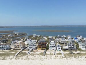 Aerial view of luxury homes along the beach in the Hamptons Long Island New York