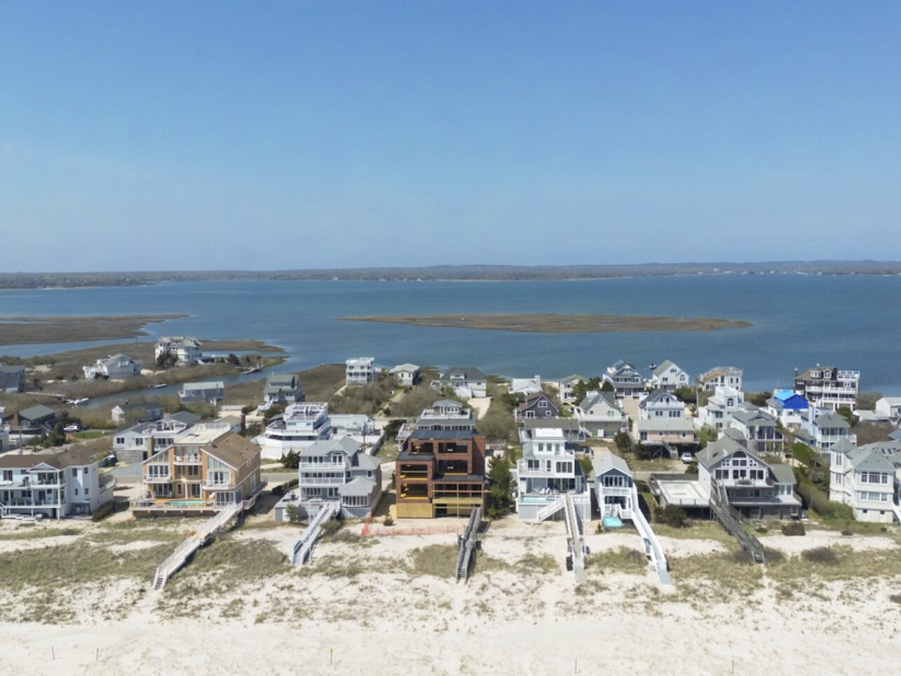 Aerial view of luxury homes along the beach in the Hamptons Long Island New York